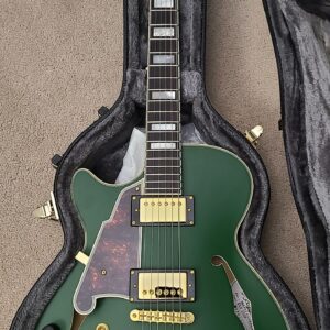 Limited edition emerald matte D'Angelico Left handed deluxe sss